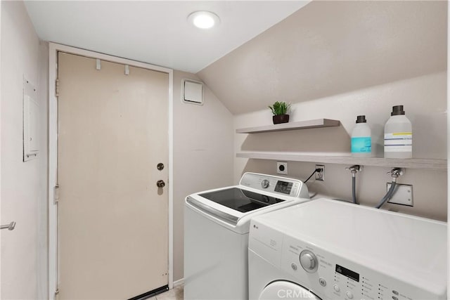 laundry area with washing machine and clothes dryer