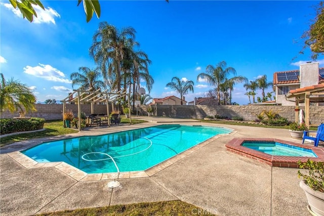 view of swimming pool featuring an in ground hot tub, a patio, and a pergola