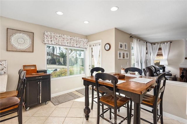 dining room featuring light tile patterned flooring