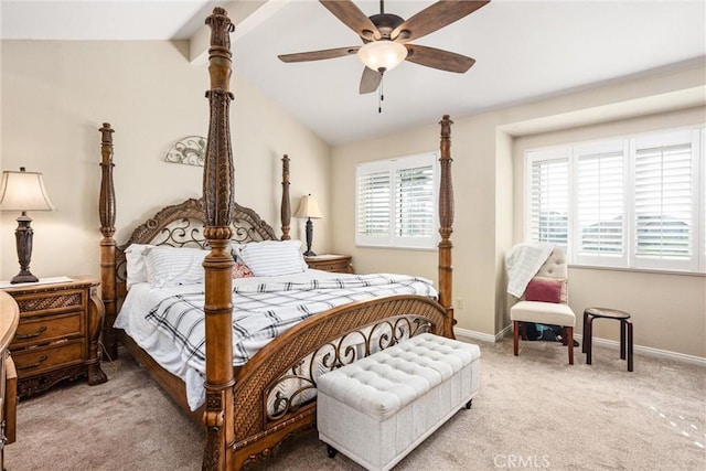 carpeted bedroom with ceiling fan and lofted ceiling