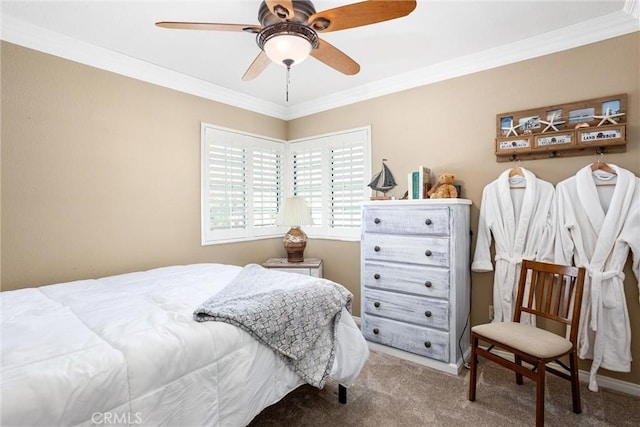 carpeted bedroom with ceiling fan and crown molding