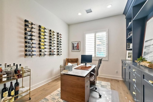 home office featuring light hardwood / wood-style flooring