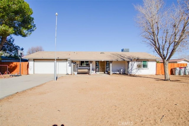 single story home with a garage