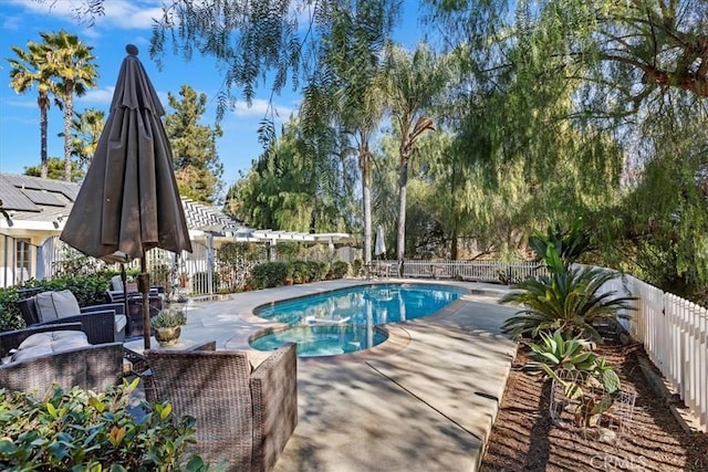 view of swimming pool featuring a patio