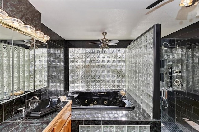 bathroom featuring separate shower and tub