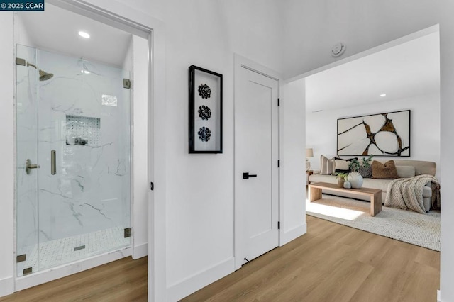 corridor featuring light hardwood / wood-style flooring