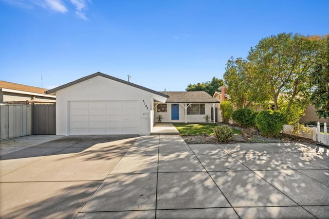 ranch-style home with a garage