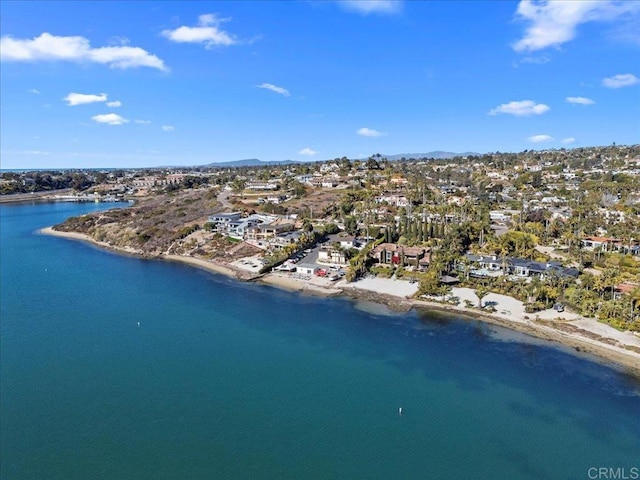 aerial view with a beach view and a water view