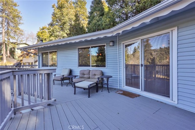 deck with an outdoor living space