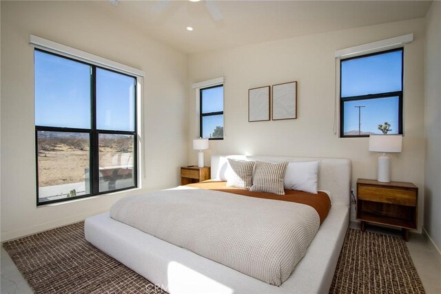 bedroom featuring ceiling fan