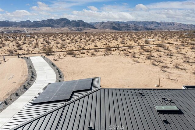 exterior space featuring a mountain view