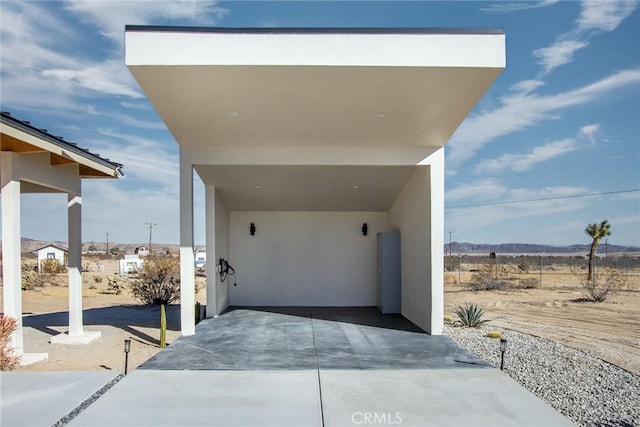 exterior space featuring a mountain view