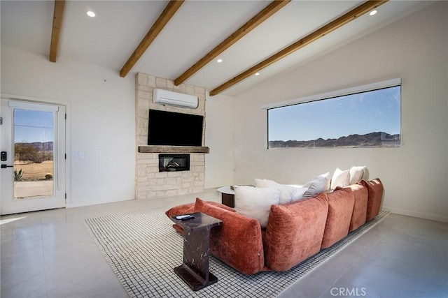 living room featuring vaulted ceiling with beams, an AC wall unit, and a stone fireplace