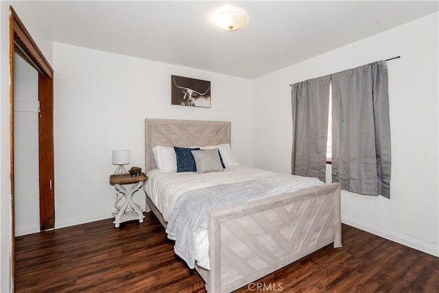 bedroom featuring dark hardwood / wood-style floors