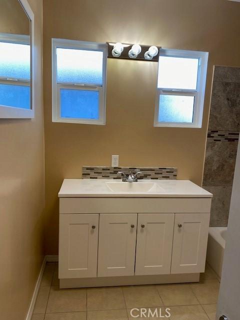 bathroom featuring vanity and tile patterned floors