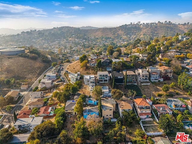 birds eye view of property featuring a mountain view