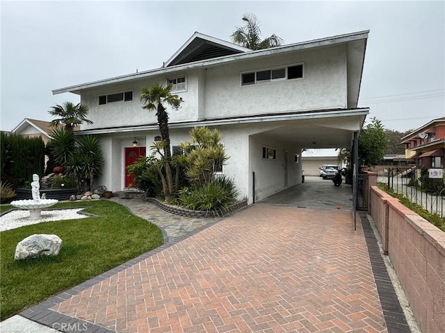 view of front of house featuring a carport