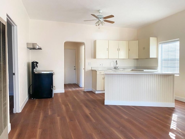 kitchen with cream cabinets, sink, dark hardwood / wood-style floors, and ceiling fan