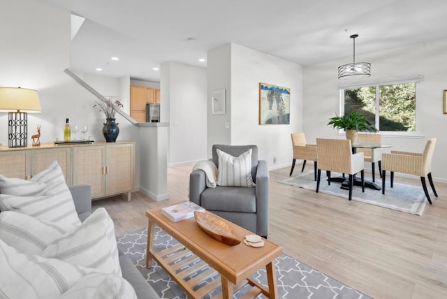 living room with light hardwood / wood-style flooring