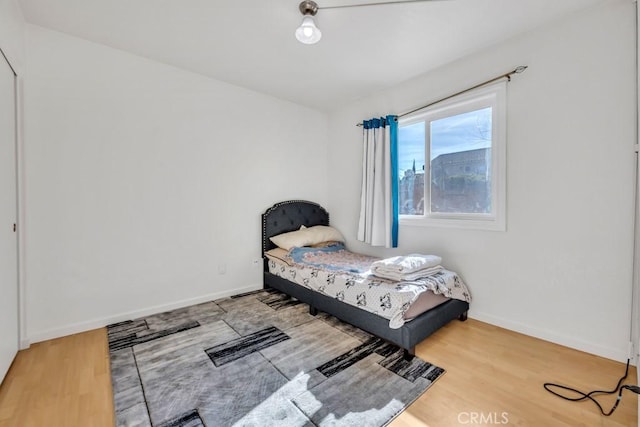 bedroom with hardwood / wood-style floors