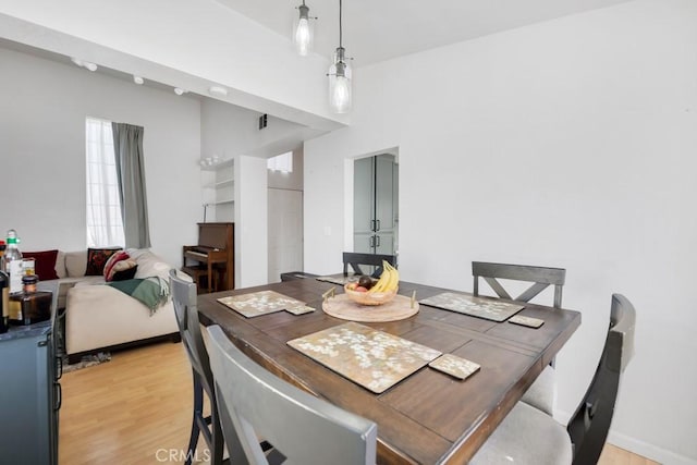 dining room featuring light hardwood / wood-style flooring