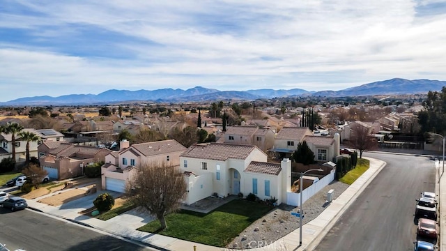 drone / aerial view featuring a mountain view