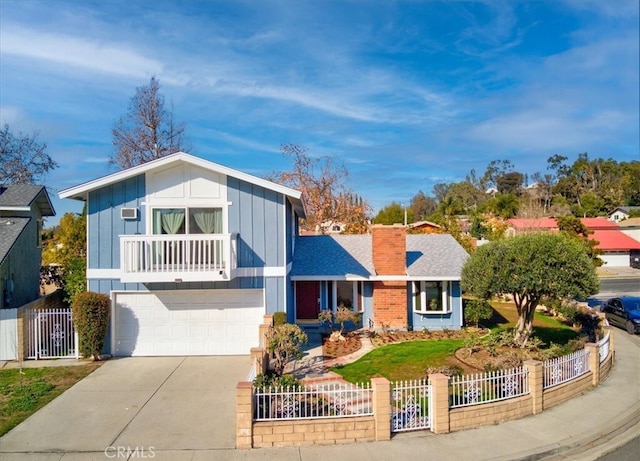 view of front of house with a balcony and a garage