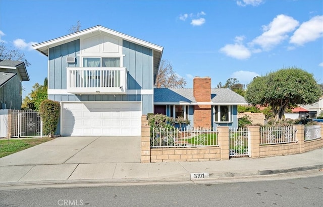 view of front of home with a balcony and a garage