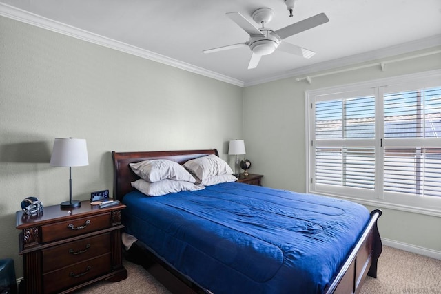 bedroom featuring light colored carpet, ceiling fan, and ornamental molding