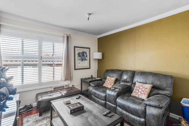 living room featuring crown molding, plenty of natural light, and hardwood / wood-style floors