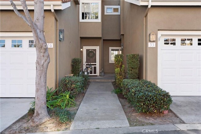 property entrance with a garage