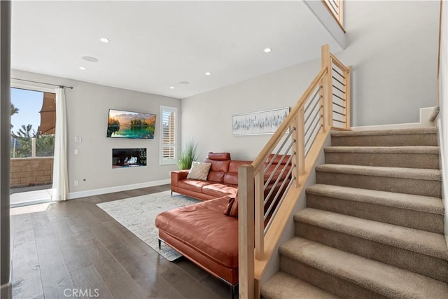 living room featuring dark wood-type flooring