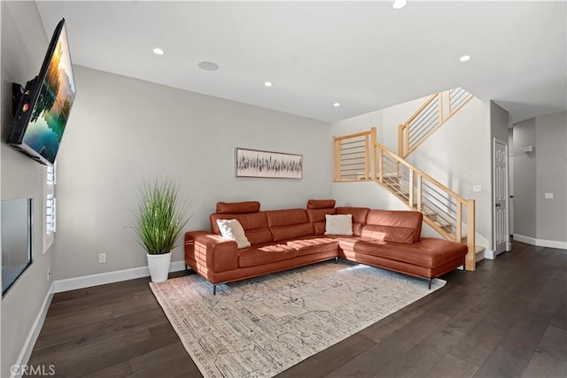 living room featuring dark wood-type flooring