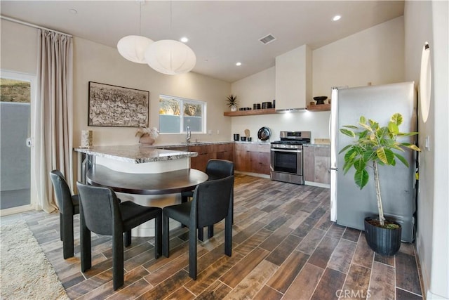 dining space with sink