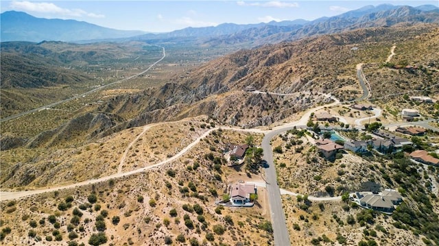 drone / aerial view featuring a mountain view