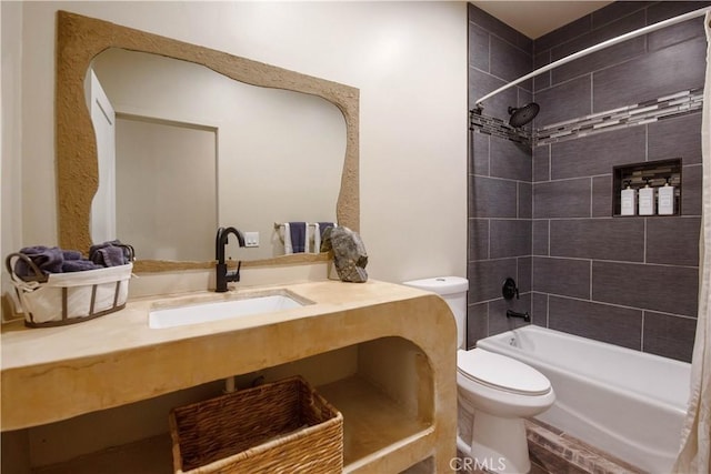 full bathroom featuring toilet, shower / bathtub combination with curtain, and sink