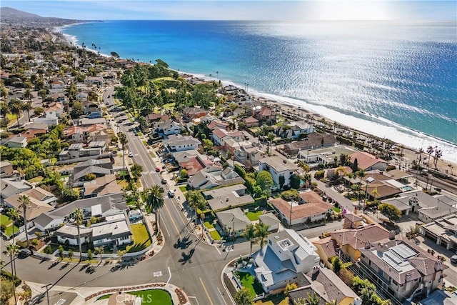 aerial view featuring a water view and a view of the beach