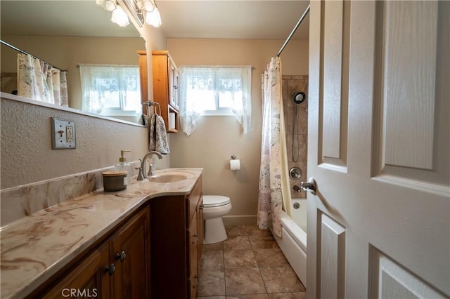 full bathroom featuring vanity, shower / bath combo, and toilet