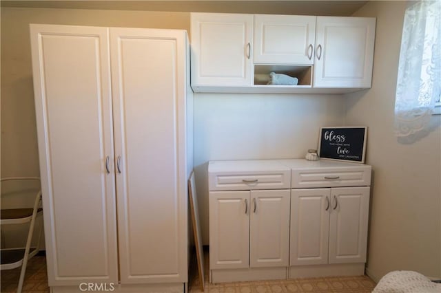 kitchen with white cabinetry