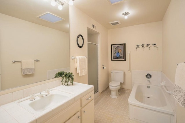 full bathroom with plus walk in shower, vanity, and toilet