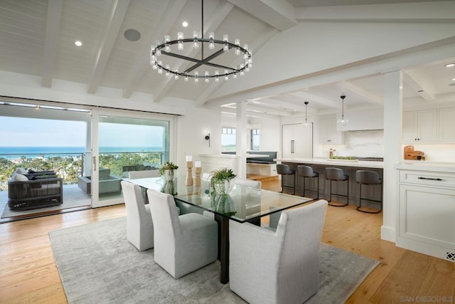 dining space featuring wood ceiling, light hardwood / wood-style flooring, lofted ceiling with beams, and an inviting chandelier