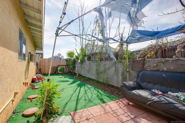 view of patio featuring cooling unit