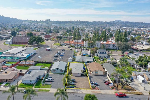 drone / aerial view featuring a mountain view