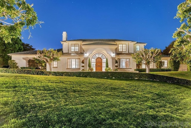 view of front of house with a front yard