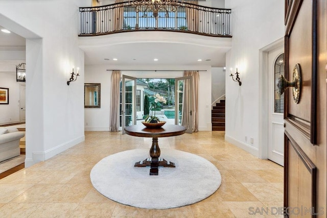 entryway with a high ceiling