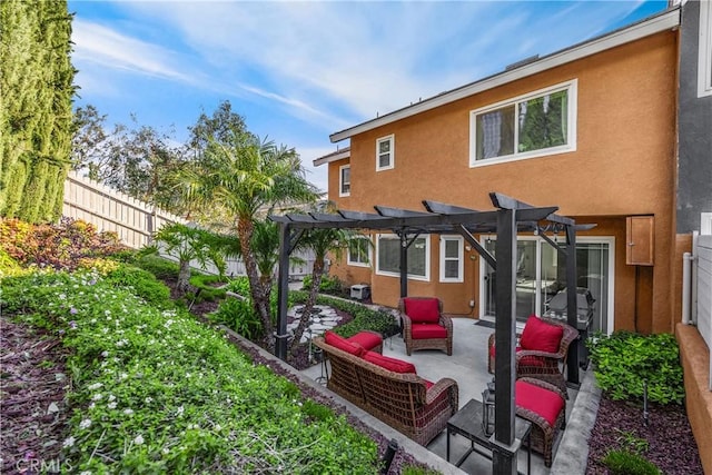 back of house featuring a pergola and a patio