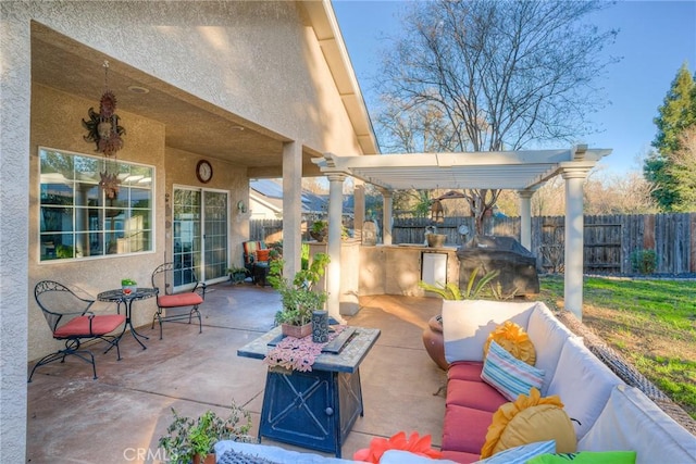 view of patio featuring a pergola, area for grilling, and an outdoor living space with a fire pit