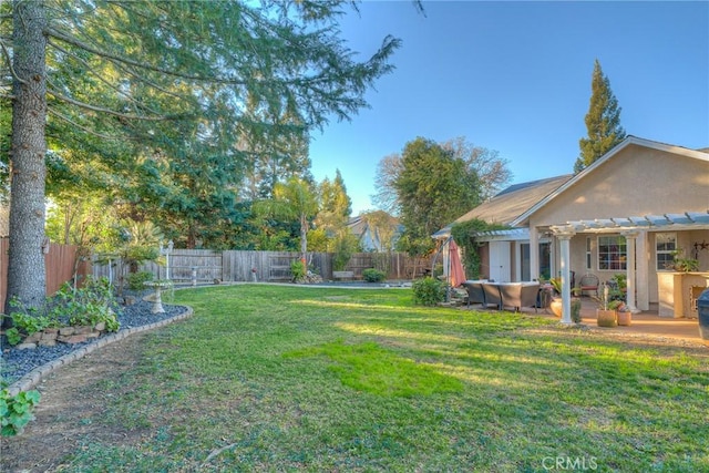 view of yard featuring a pergola and a patio