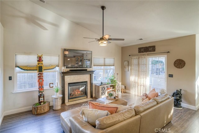 living room featuring hardwood / wood-style flooring and ceiling fan