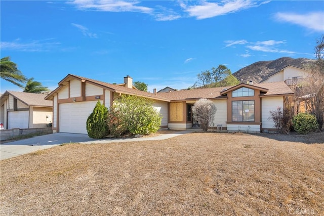 ranch-style home with a garage